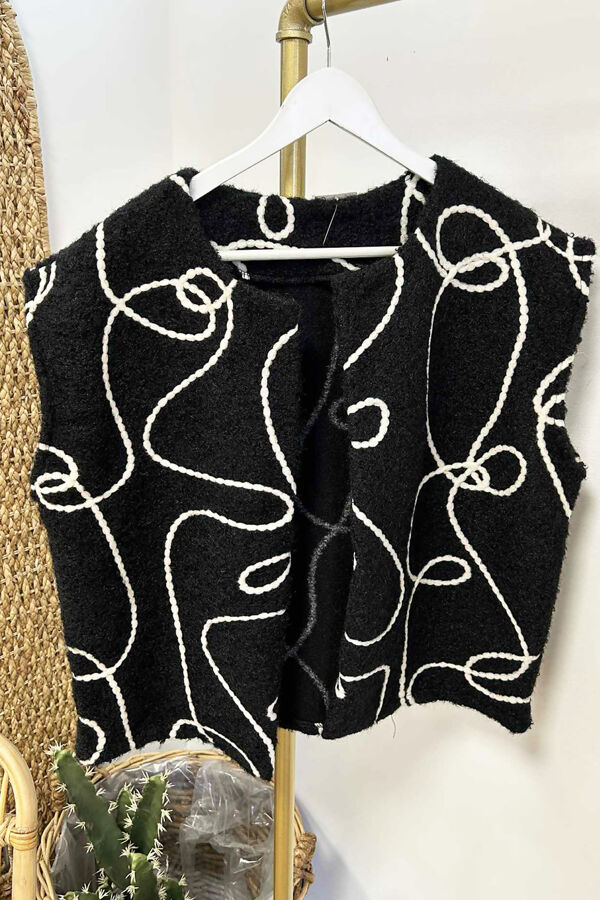 The-Swirl-Detail-Boucle-Gilet-Black.jpg
