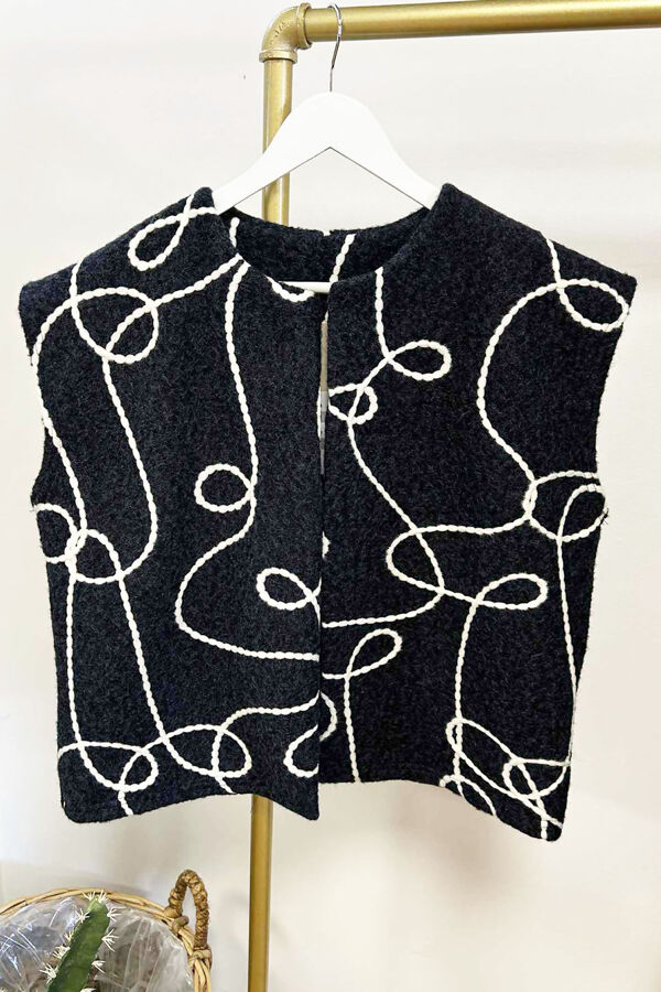 The-Swirl-Detail-Boucle-Gilet-Navy.jpg